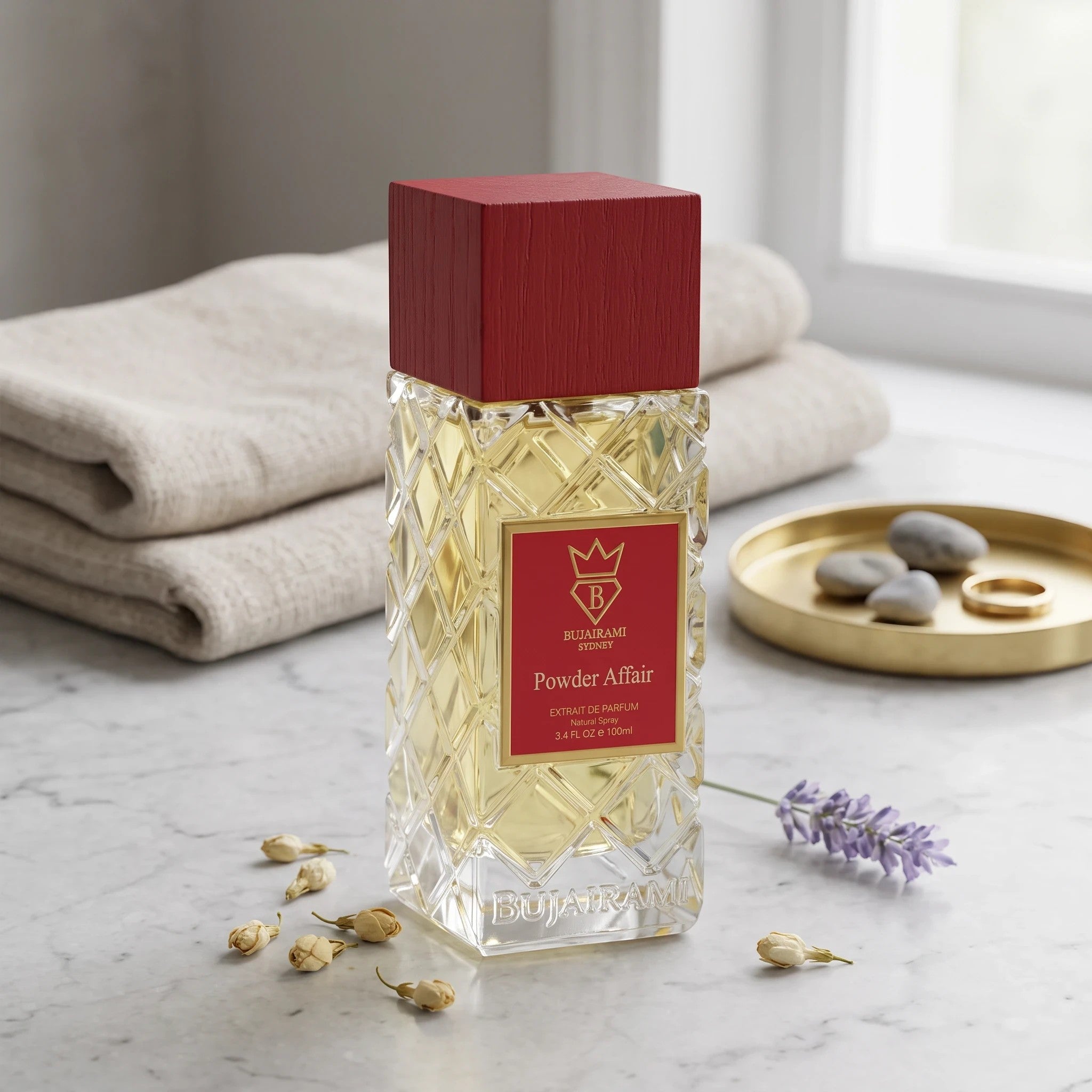 Soghaat Bujairami Powder Affair 100ml Extrait de Parfum in a crystal-cut glass bottle with a red wooden cap.