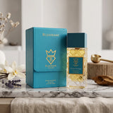 Soghaat Bujairami Sweet Escape 100ml Extrait de Parfum bottle and blue leather case on a marble surface.