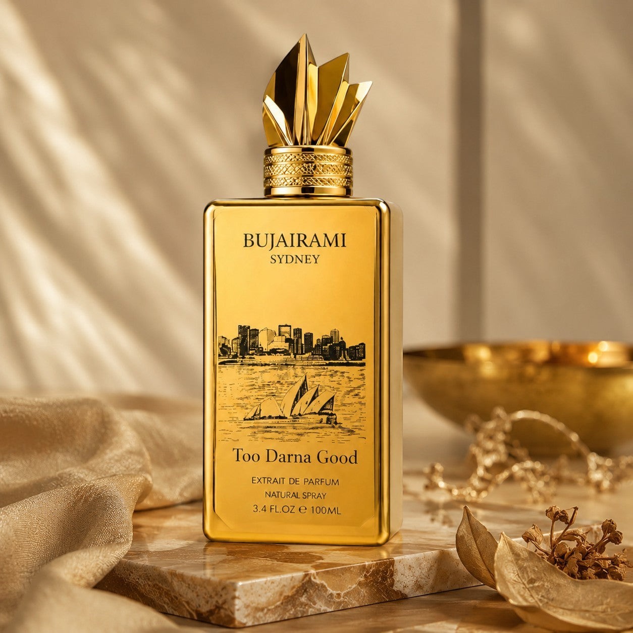 Soghaat Bujairami Too Damn Good 100ml Extrait de Parfum in a luxurious gold bottle with a unique sculptural cap.