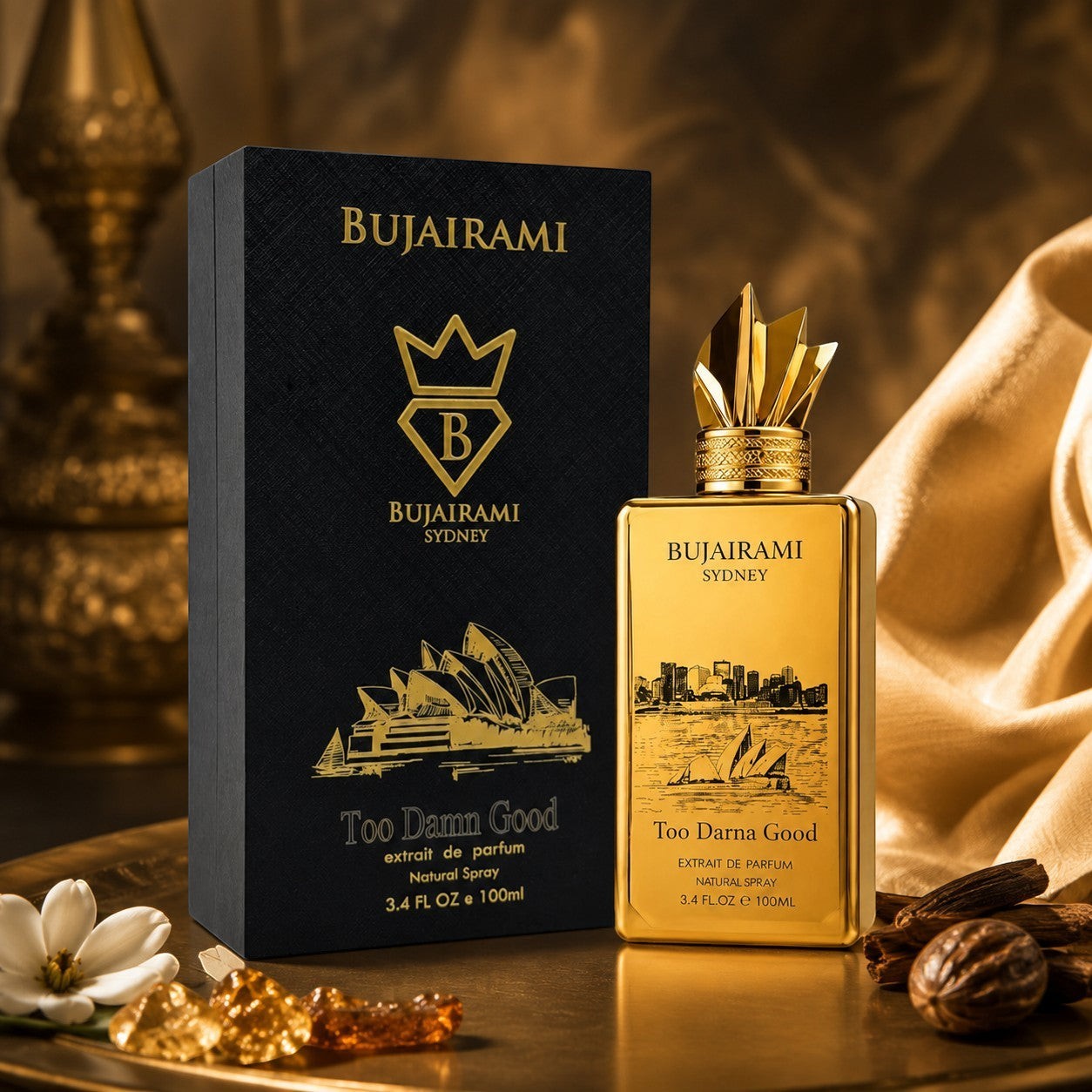 Soghaat Bujairami Too Damn Good 100ml Extrait de Parfum in a gold bottle with a black presentation box on a tray.