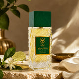 Soghaat Bujairami Vibration 100ml Extrait de Parfum in a textured glass bottle with a green wooden cap on stone.