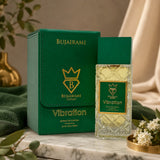 Soghaat Bujairami Vibration 100ml Extrait de Parfum bottle and green leather presentation box on a marble surface.
