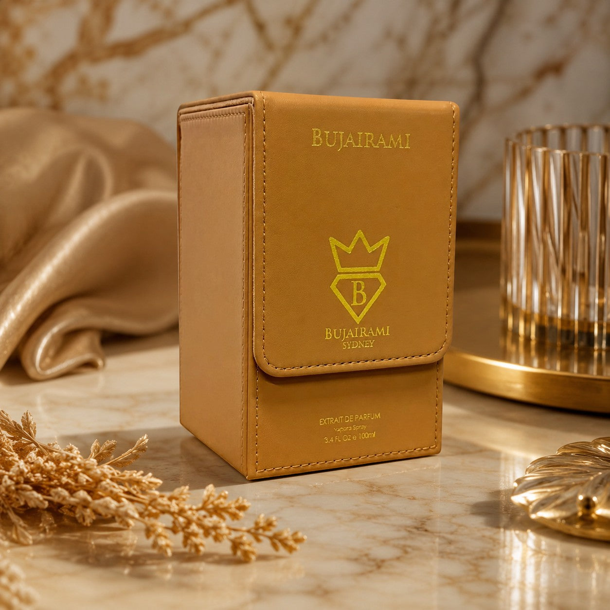 Soghaat Bujairami Ya Habibi 100ml Extrait de Parfum in a tan leather-style case on a marble surface.