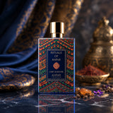 Soghaat Chef d’Oeuvre Extrait de Parfum by Anfar London in an ornate, colourful bottle on a dark marble surface.