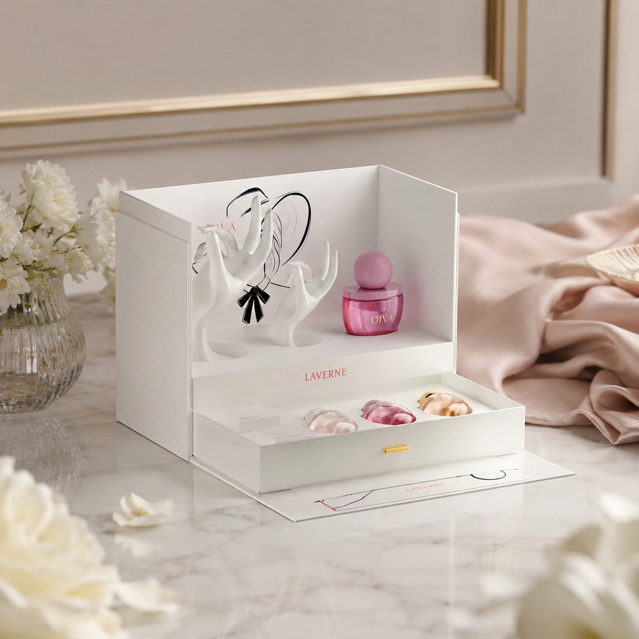 Soghaat Diva Perfume Gift Set for women, featuring three Eau de Parfum fragrances in elegant pink and gold bottles, presented in a white display box with artistic accents.