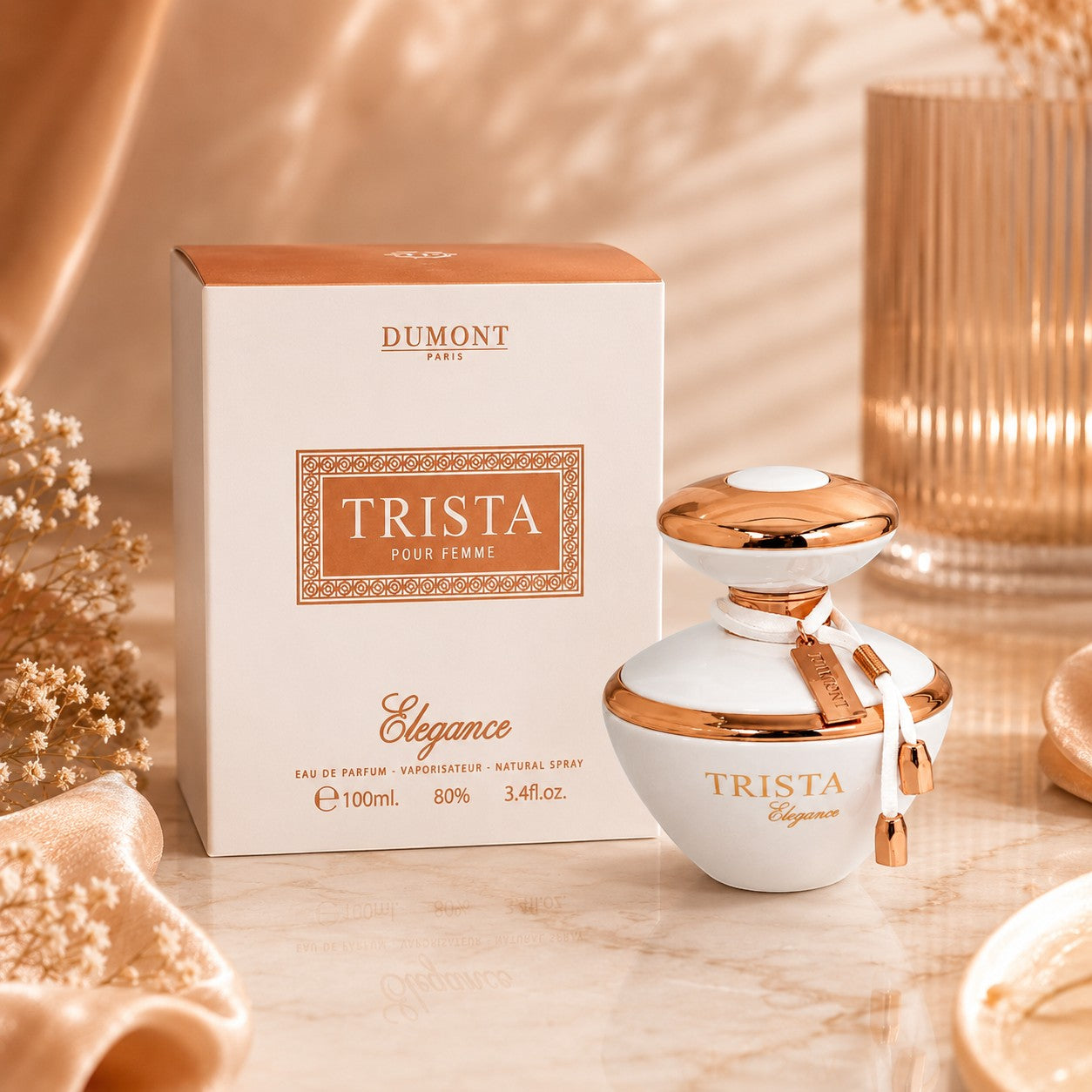 Soghaat Dumont Paris Trista Elegance 100ml Eau de Parfum bottle and box in a bright, elegant, warm-toned setting.