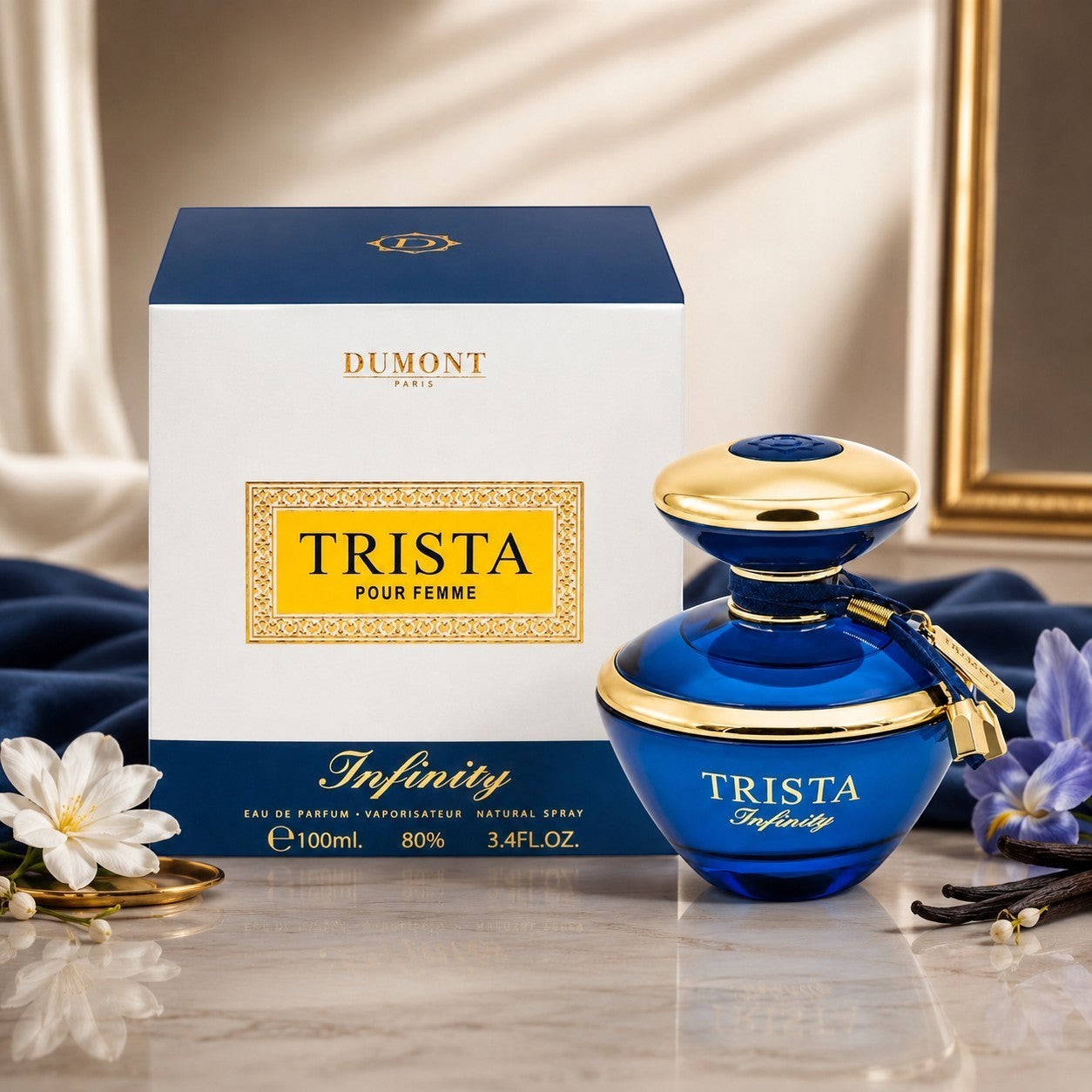 Soghaat Dumont Paris Trista Infinity Eau de Parfum bottle and box with gold accents on a marble surface.