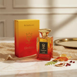 Soghaat Gladiator Eau de Parfum 100ml, a woody aromatic fragrance with a gradient bottle from red to orange and gold cap.