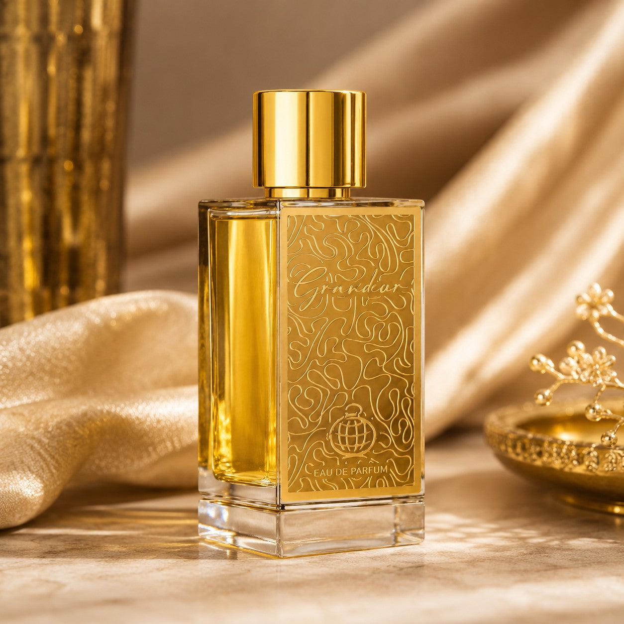 Soghaat Grandeur Eau de Parfum, a fresh woody aromatic unisex fragrance with a gold patterned bottle.