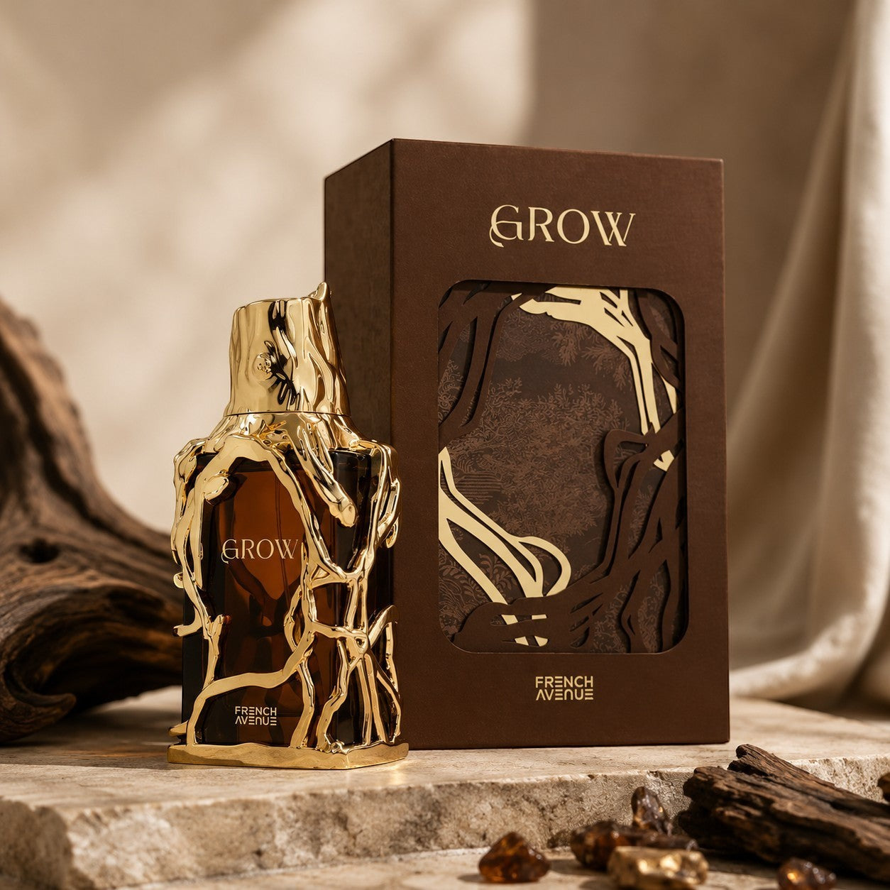 Soghaat Grow 100ml Extrait de Parfum bottle with ornate gold branches and brown box. Amber woody oriental fragrance.