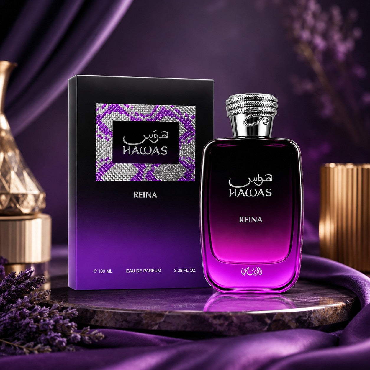 Soghaat Hawas Reina Eau de Parfum bottle and box in purple and black with metallic accents on a silk fabric surface
