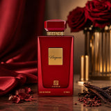 Soghaat Hayana Eau de Parfum by Ahmed Al Maghribi in a deep red bottle with gold accents, set against red roses.