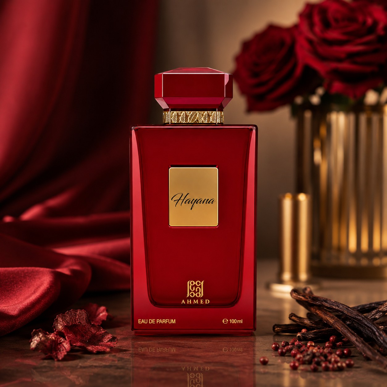 Soghaat Hayana Eau de Parfum by Ahmed Al Maghribi in a deep red bottle with gold accents, set against red roses.