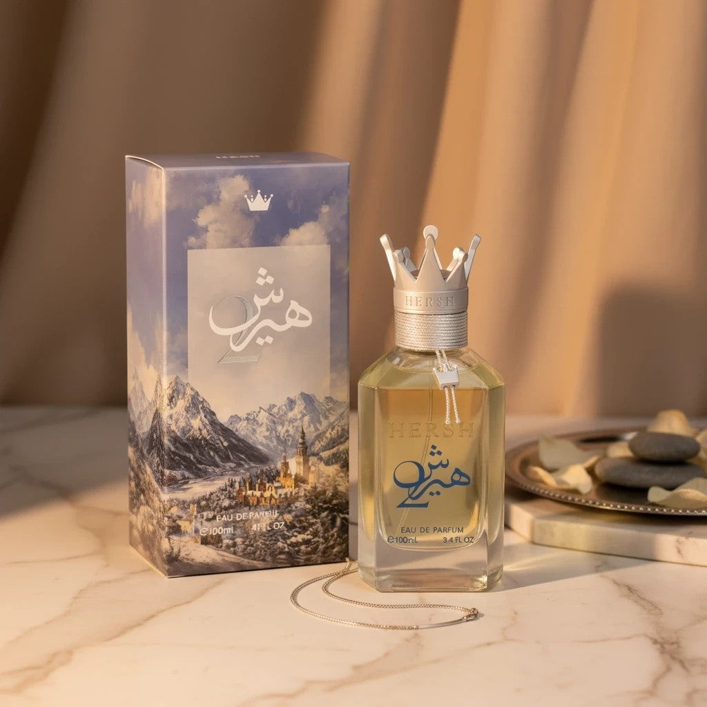 Soghaat Hersh 2 100ml Eau de Parfum bottle with crown cap and matching box, featuring a winter mountain landscape.