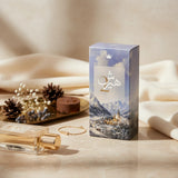 Soghaat Hersh 2 100ml Eau de Parfum bottle and box with winter mountain landscape. Unisex citrus aromatic fragrance.