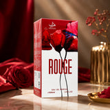 Soghaat Hersh Rouge Eau de Parfum 100ml box featuring red floral artwork on a marble surface with roses and gold decor.