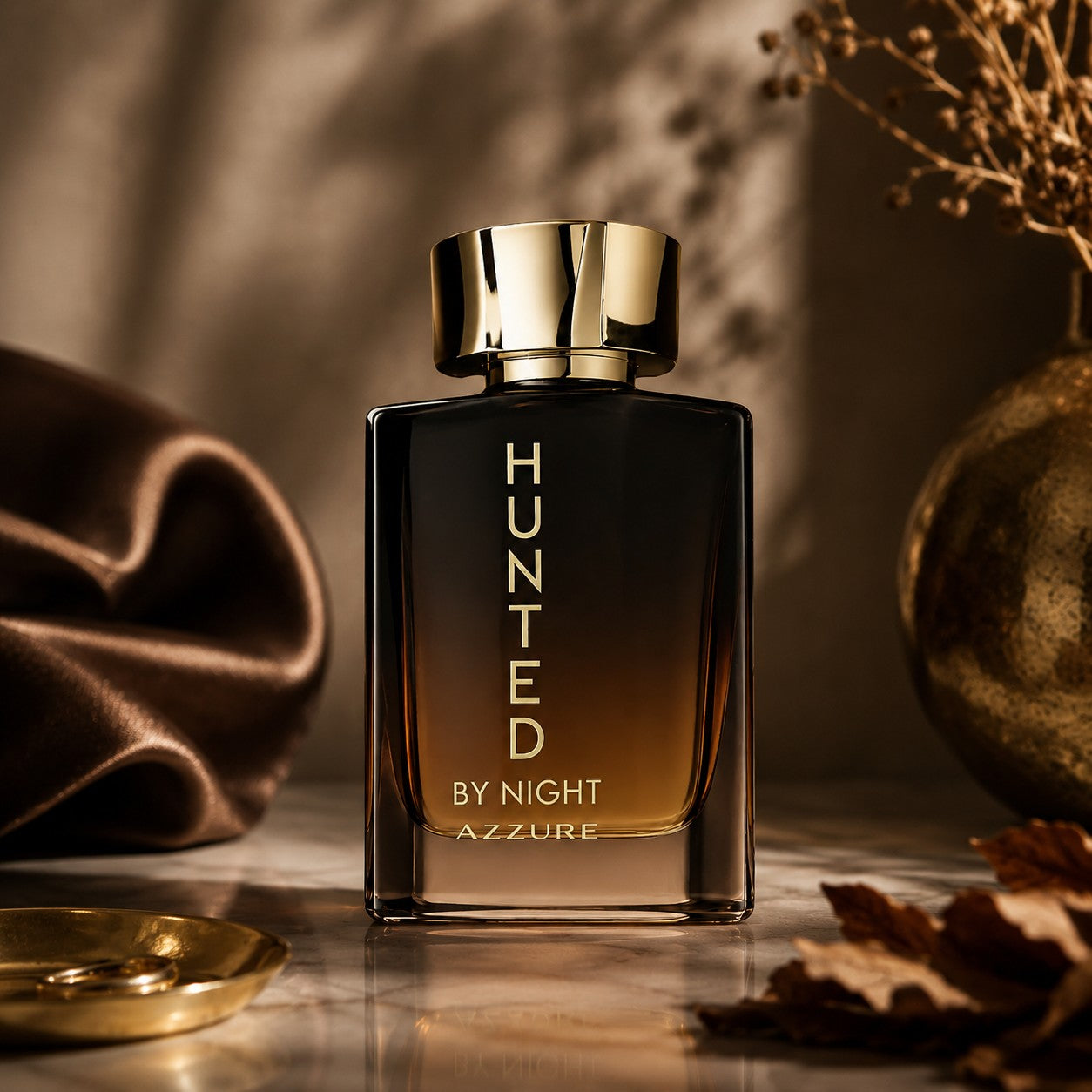 Soghaat Hunted By Night Azzure 100ml Eau de Parfum for men, a fresh woody aromatic fragrance with a gradient dark to amber bottle and gold cap.