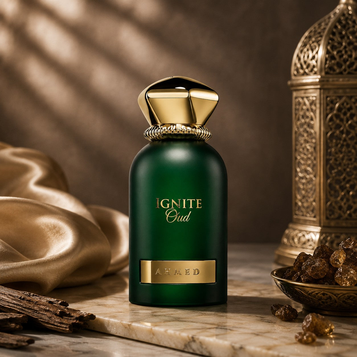Soghaat Ignite Oud by Ahmed Al Maghribi, a green 60ml unisex Eau de Parfum bottle with gold accents on a marble base.