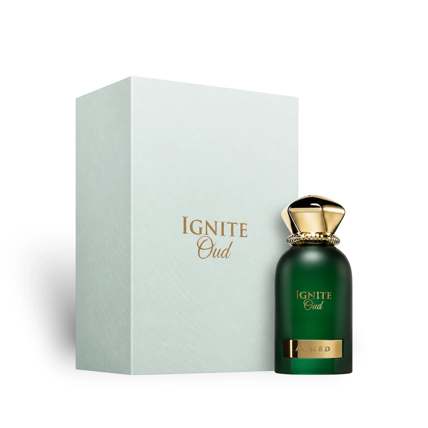 Soghaat Ignite Oud 60ml Eau de Parfum by Ahmed Al Maghribi in a green bottle with gold cap next to its gift box.