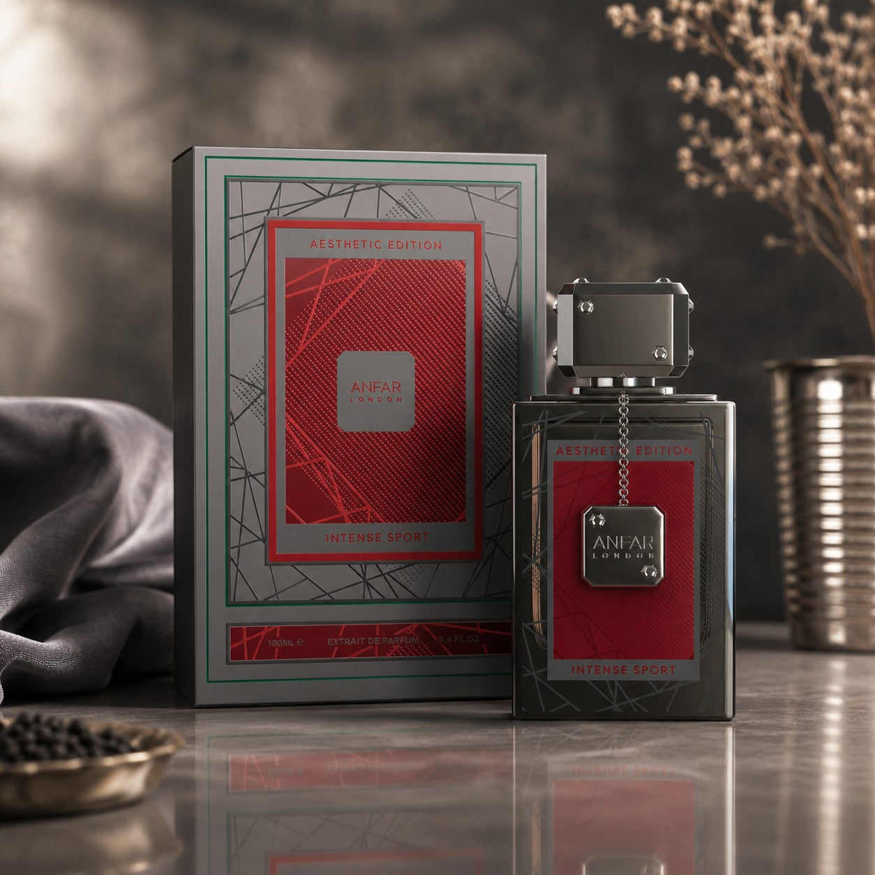Soghaat Intense Sport Extrait de Parfum by Anfar London in a sleek bottle with red accents next to its matching box.