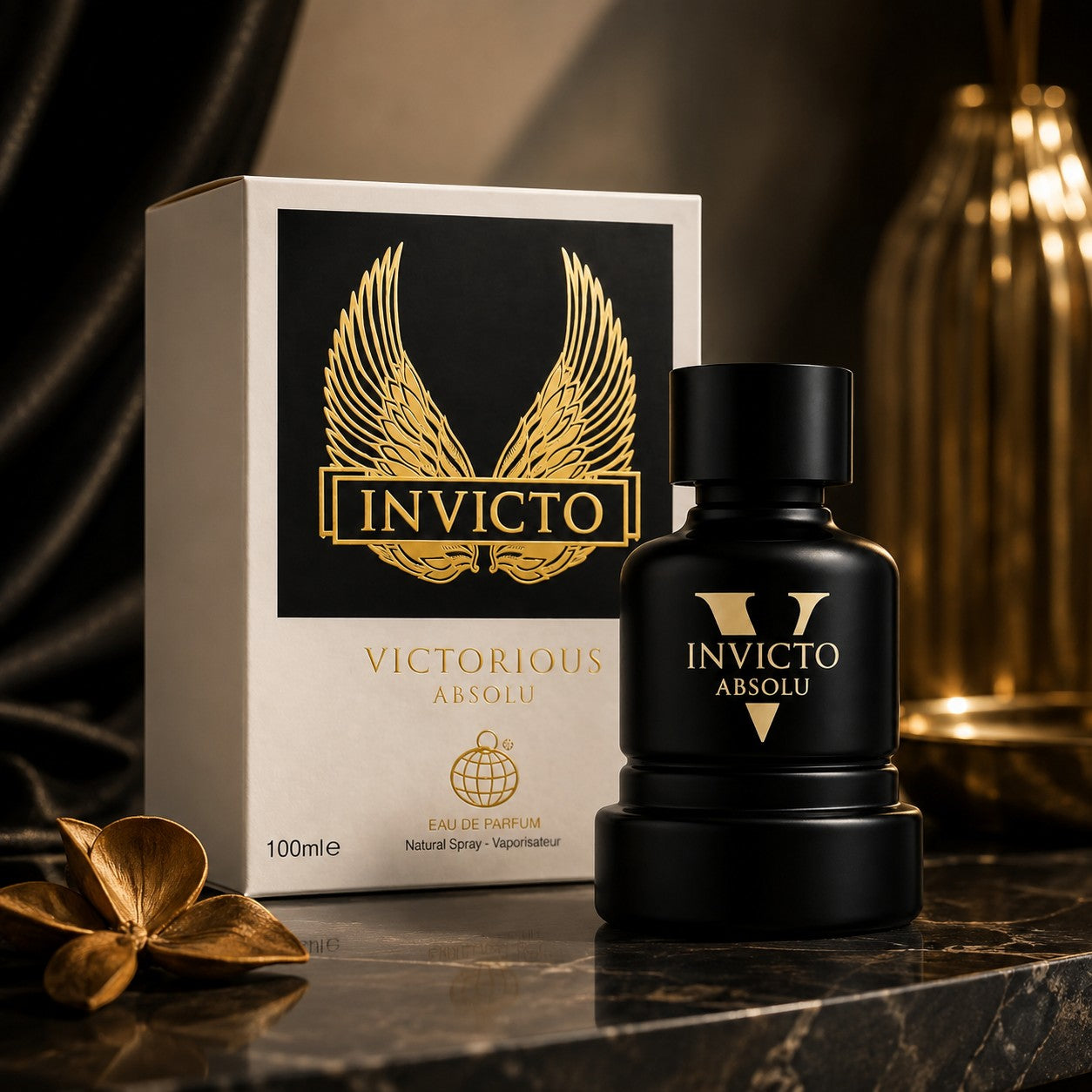 Soghaat Invicto Victorious Absolu Eau de Parfum bottle and box featuring gold wing logo on a dark marble surface.