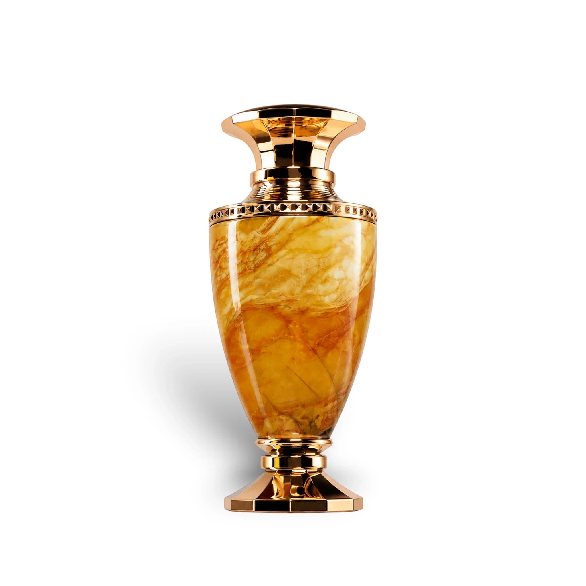 Soghaat Jade Giallo Extrait de Parfum bottle with a marbled amber body and gold accents. Fresh woody aromatic fragrance.