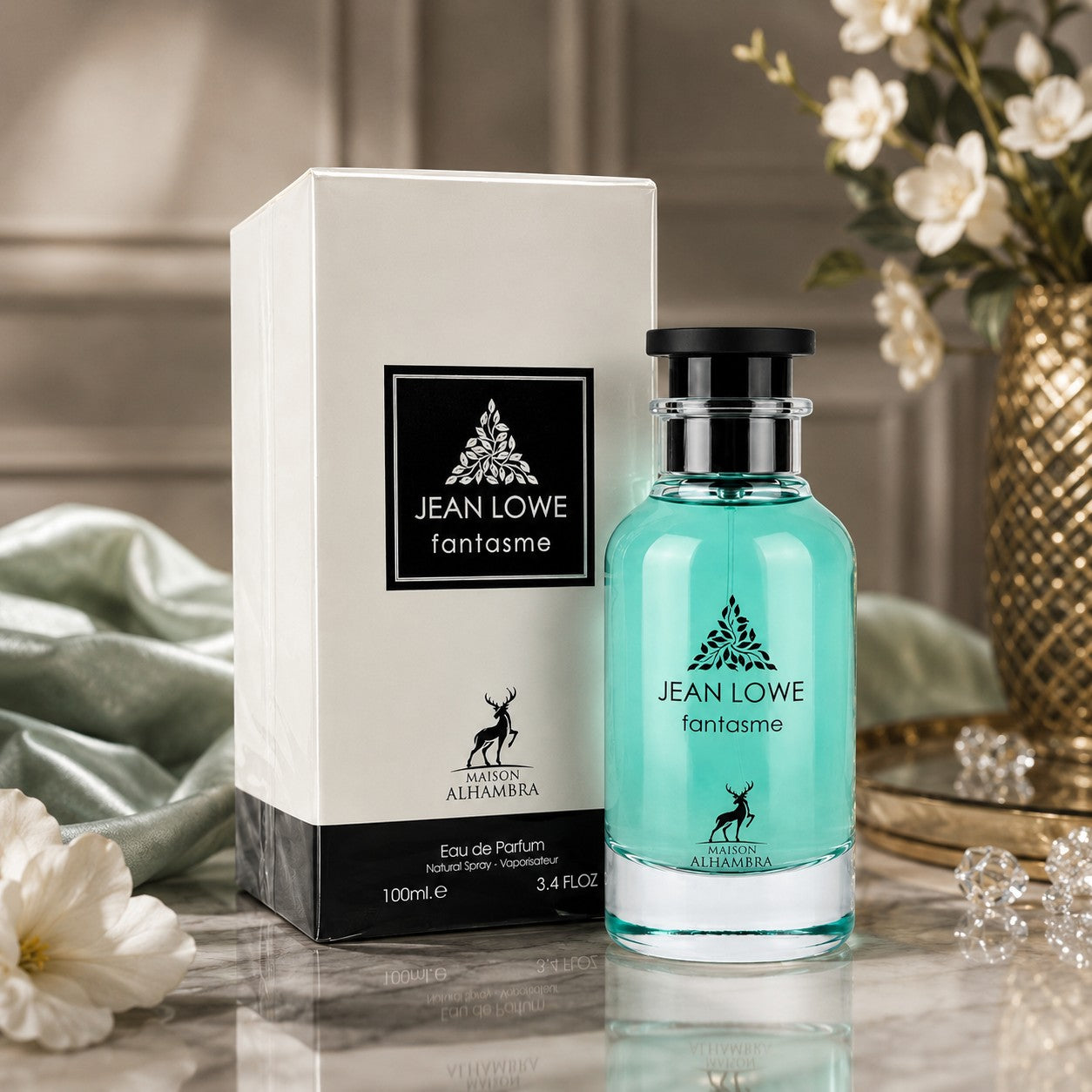 Soghaat Maison Alhambra Jean Lowe Fantasme 100ml Eau de Parfum bottle and box on a marble surface with floral decor.