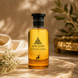 Soghaat Jean Lowe Summer Vibes Eau de Parfum bottle with amber liquid, elegant branding, and floral accents.