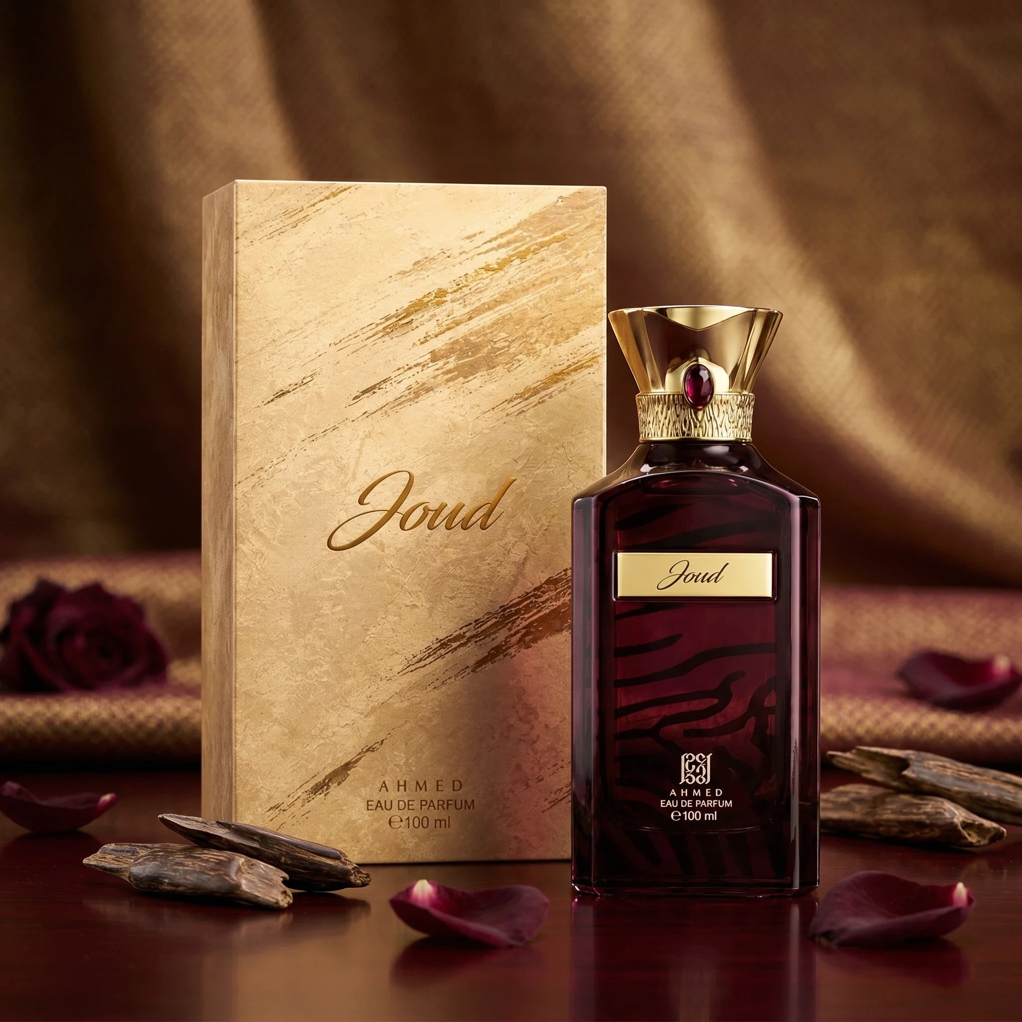 Soghaat Ahmed Al Maghribi Joud 100ml Eau de Parfum bottle with gold box, featuring amber gourmand scent notes.