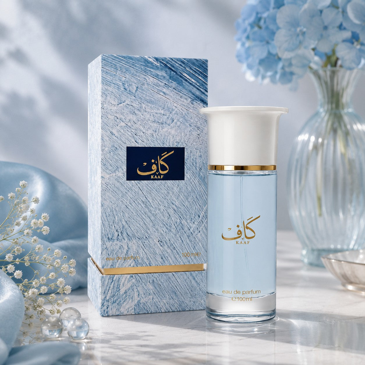 Soghaat Kaaf 100ml Extrait de Parfum by Ahmed Al Maghribi in a blue textured box with a matching glass fragrance bottle