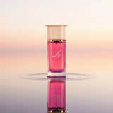 Soghaat Kaaf Pink Extrait de Parfum for men, a woody, fresh citrus, and floral fragrance in a pink glass bottle.