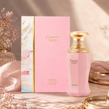 Soghaat presents Afnan Kiaana Crush Eau de Parfum in a pink bottle and box with gold accents, featuring amber oud notes.