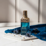 Soghaat Klikat Blue 200ml Eau de Parfum, a unisex fresh citrus woody fragrance with a blue glass bottle and gold accents.