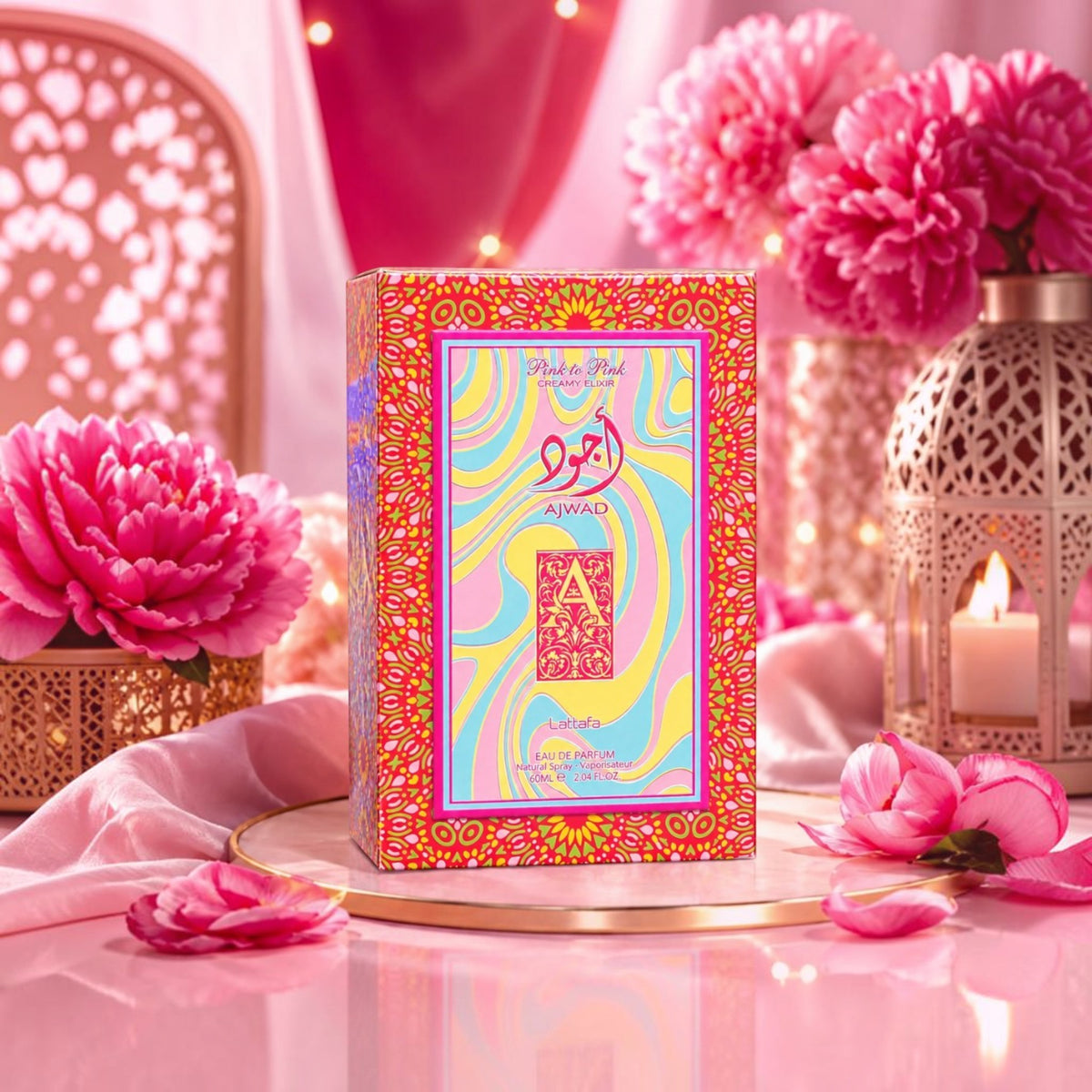 Soghaat Lattafa Ajwad Pink to Pink Creamy Elixir perfume box with vibrant floral patterns and pink peony decor
