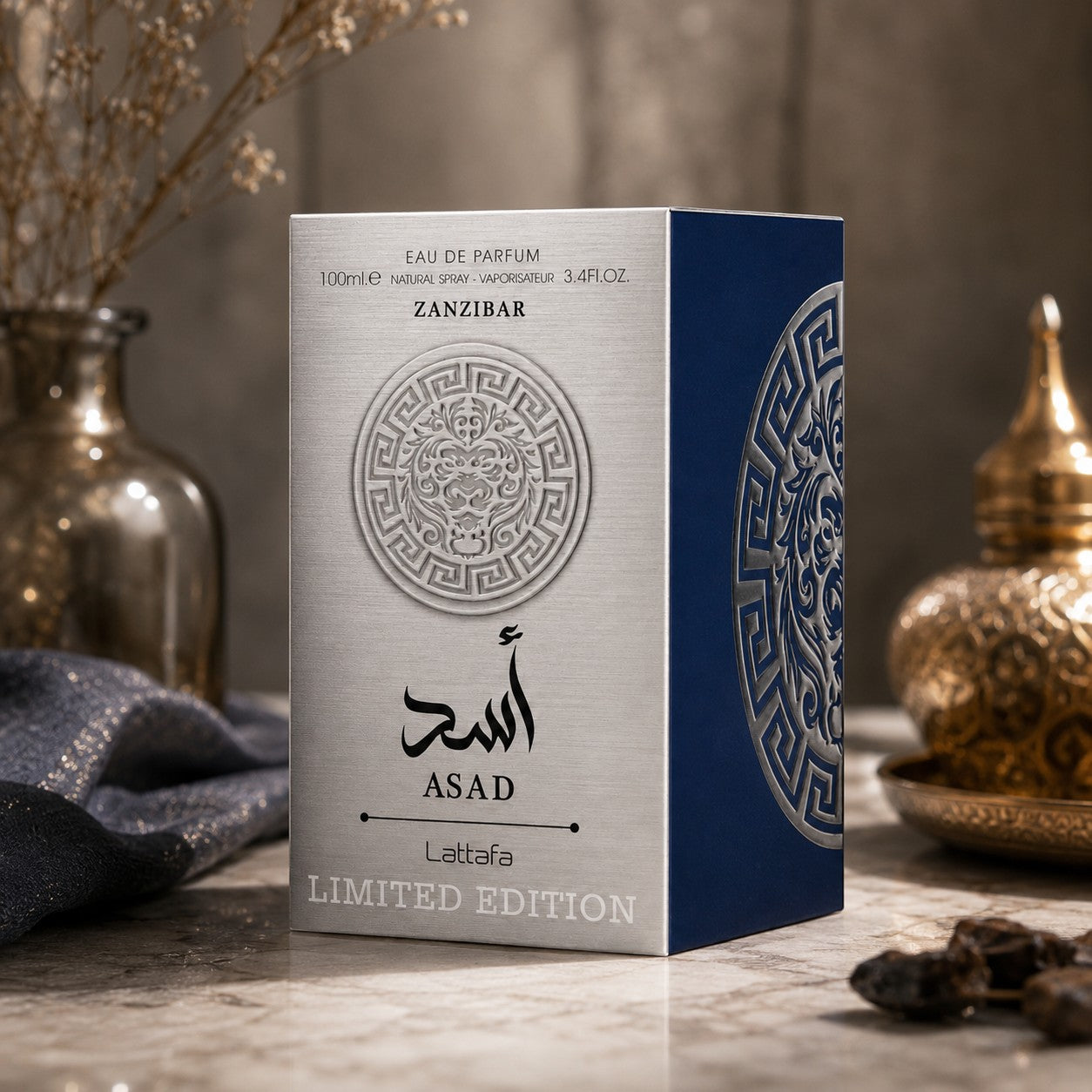 Soghaat Lattafa Asad Zanzibar Limited Edition 100ml Eau de Parfum box with silver and blue metallic design.