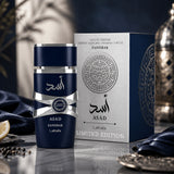 Soghaat Lattafa Asad Zanzibar Limited Edition 100ml Eau de Parfum bottle and silver box on a marble surface.