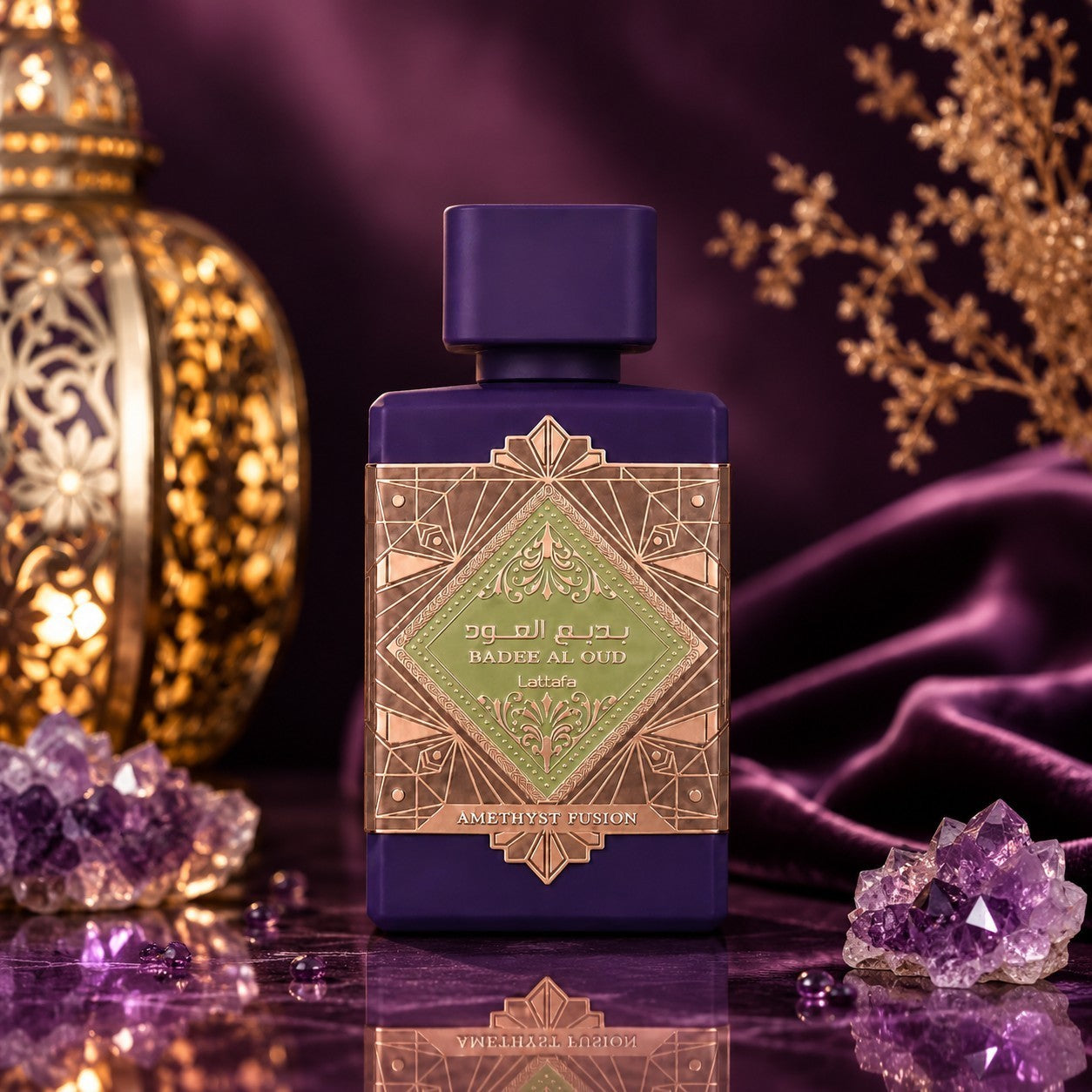 Soghaat Lattafa Bade'e Al Oud Amethyst Fusion perfume bottle with gold detailing, set against purple velvet and crystals.