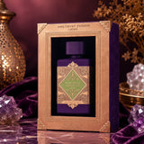 Soghaat Lattafa Bade'e Al Oud Amethyst Fusion perfume bottle in a decorative gold and purple box with crystal accents.