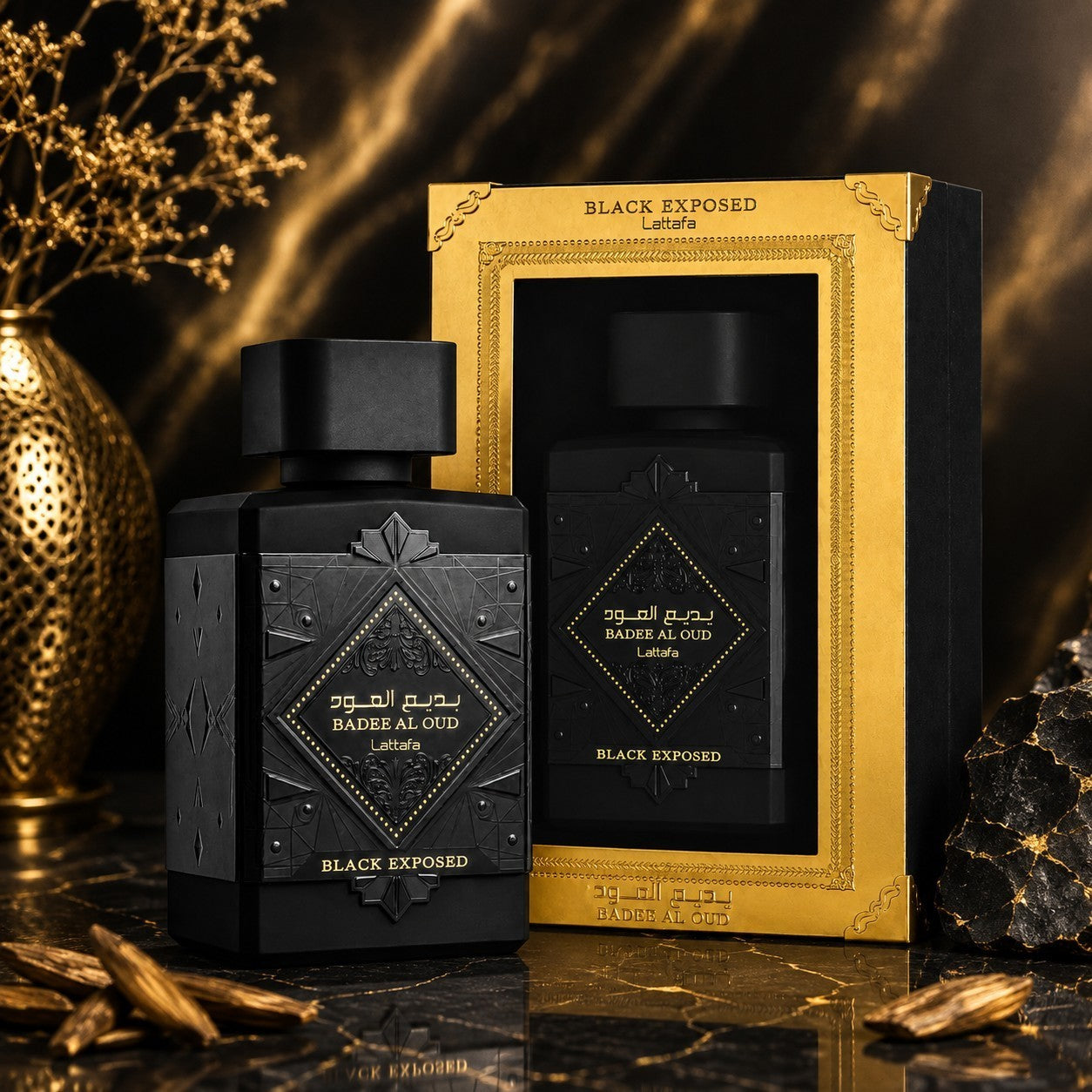 Soghaat Lattafa Badee Al Oud Black Exposed unisex Eau de Parfum bottle and gold-trimmed presentation box.