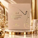 Soghaat Le Falcone Symphony Melody 100ml Eau de Parfum in a beige box with gold calligraphy on a marble pedestal.