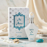 Soghaat Ma'Alaina Eau de Parfum by Nabeel in a white bottle with teal text, displayed with its matching box.