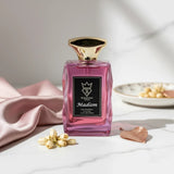 Soghaat Madam 100ml Eau de Parfum for women, a citrus floral amber musk fragrance with a pink gradient bottle and gold cap.