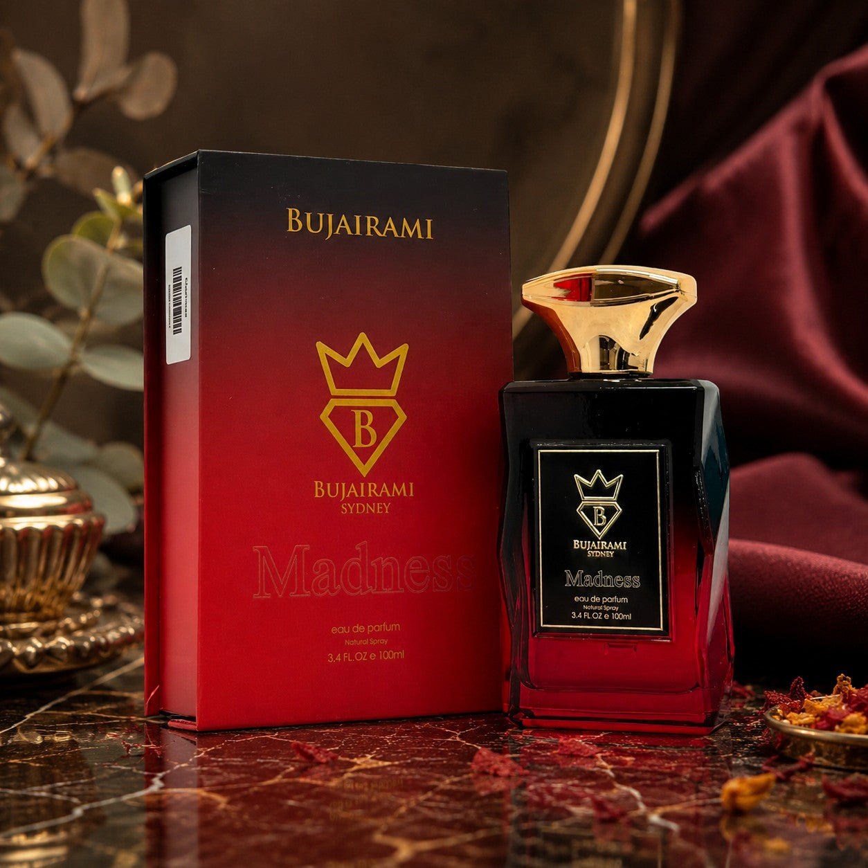 Bujairami Madness Eau de Parfum 100ml bottle and box, featuring a gradient red and black design with gold accents.