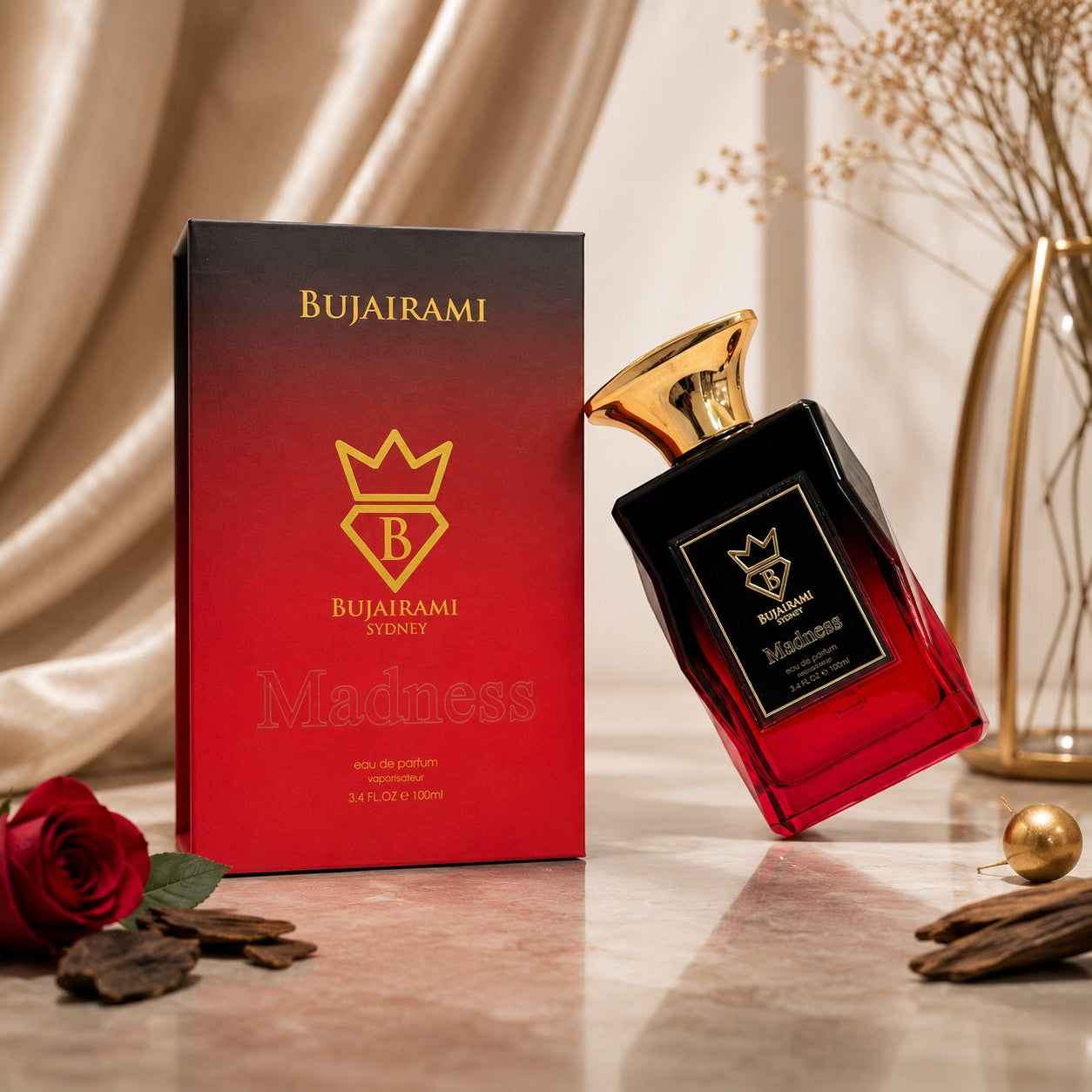 Soghaat Madness Eau de Parfum 100ml bottle with red gradient box. Smoky amber and oud fragrance.