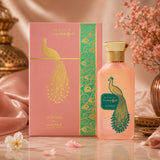 Soghaat Mahib Adyan Eau de Parfum by Anfar in a pink bottle and box featuring an elegant gold peacock design.