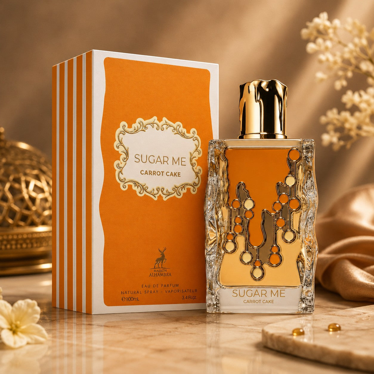 Soghaat Maison Alhambra Sugar Me Carrot Cake Eau de Parfum bottle and orange striped box on a marble surface.
