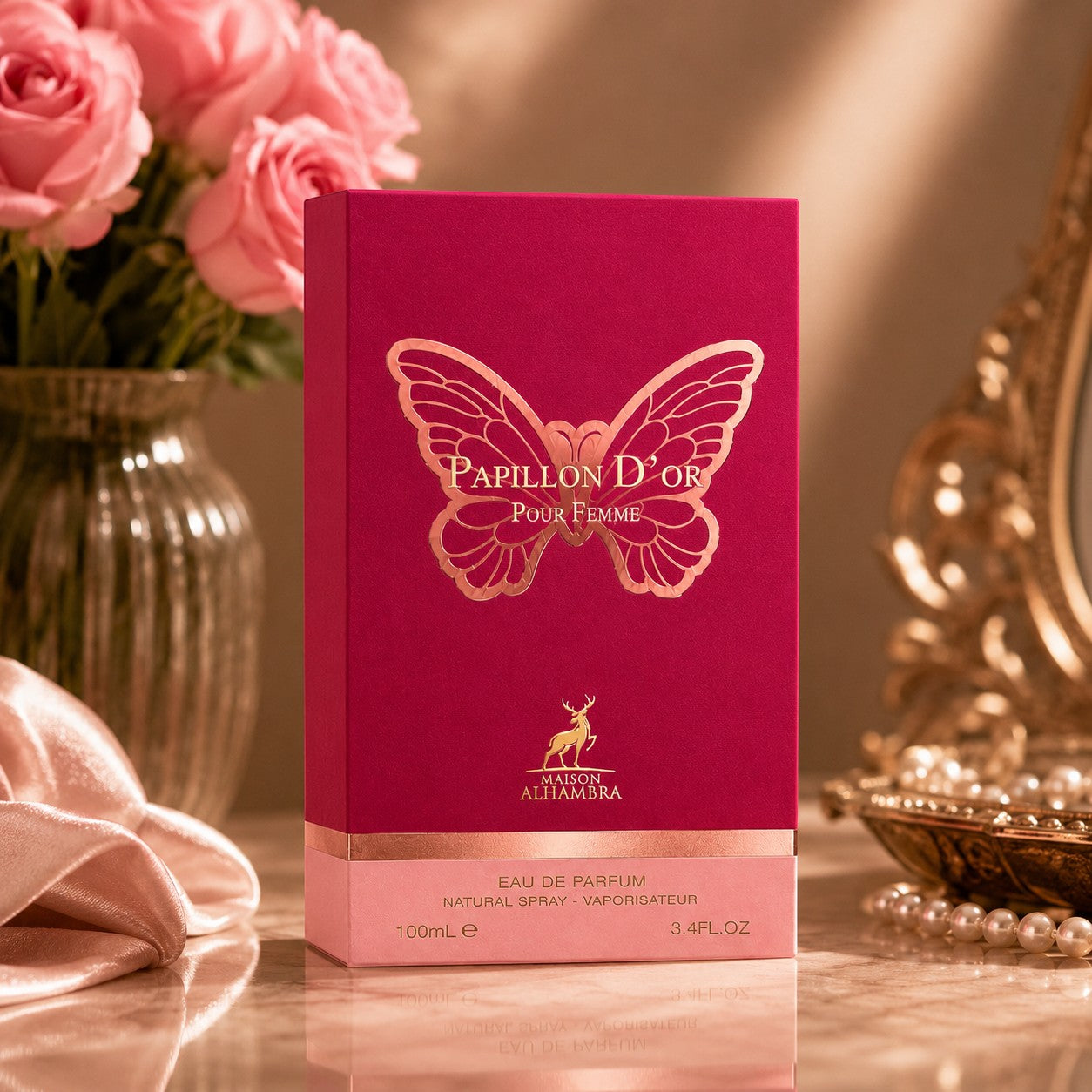 Soghaat Maison Alhambra Papillon D'Or 100ml Eau de Parfum box with gold butterfly logo on a pink background.
