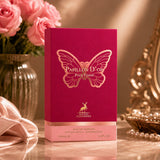 Soghaat Maison Alhambra Papillon D'Or 100ml Eau de Parfum box with gold butterfly logo on a pink background.