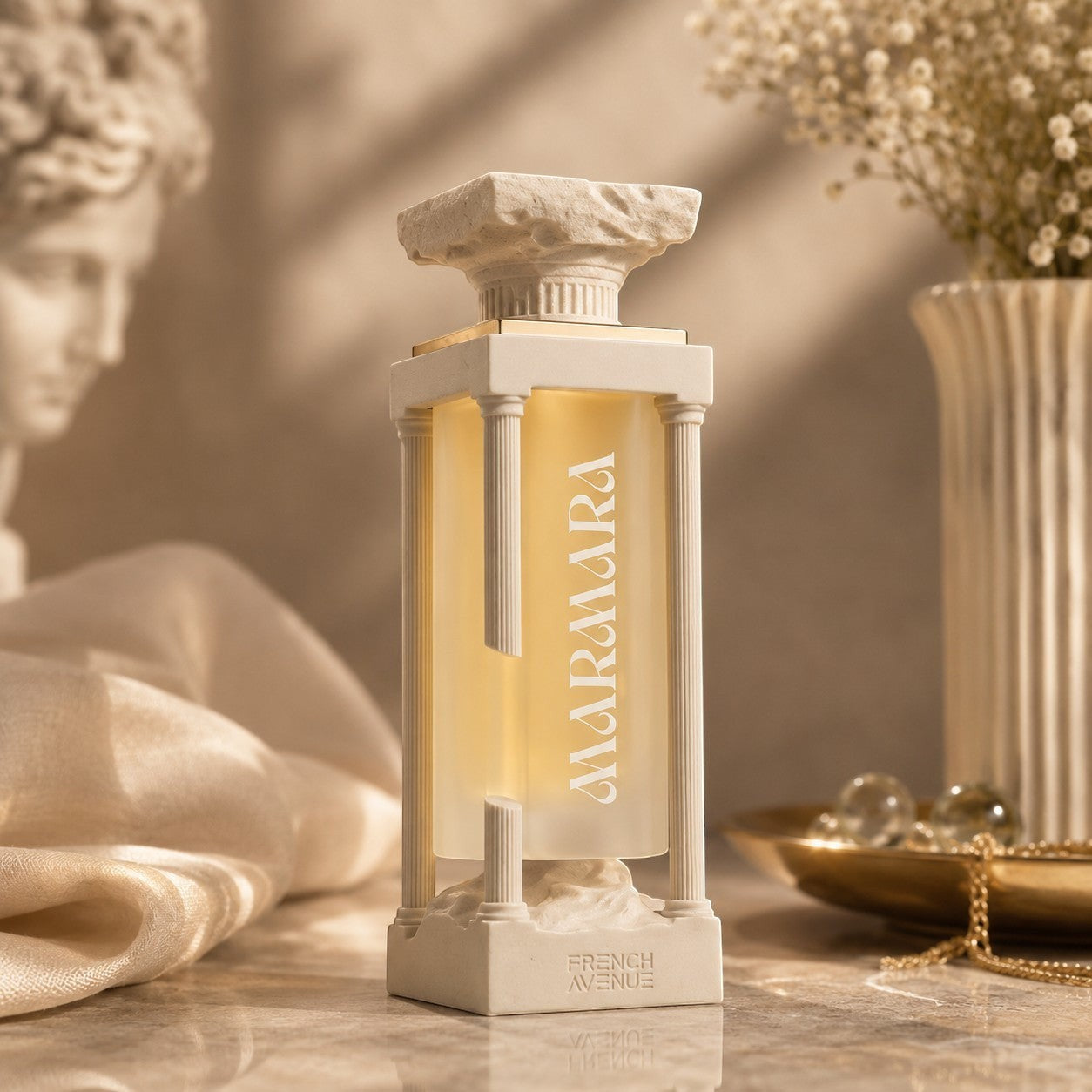 Soghaat Marmara 100ml Extrait de Parfum bottle with Greek-inspired column design, featuring a frosted glass vial and gold accents.