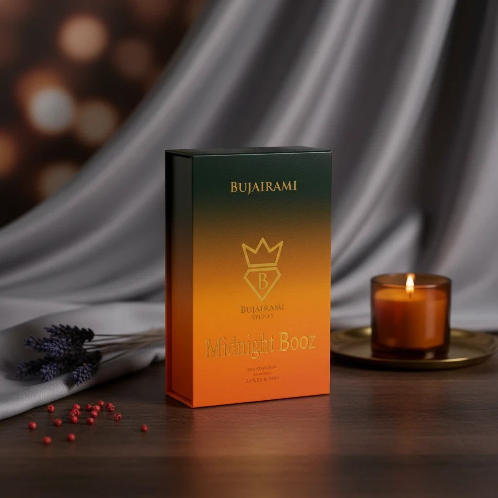 Soghaat Midnight Booz 100ml Eau de Parfum box with amber, orange, and green gradient. Unisex oriental woody fragrance.